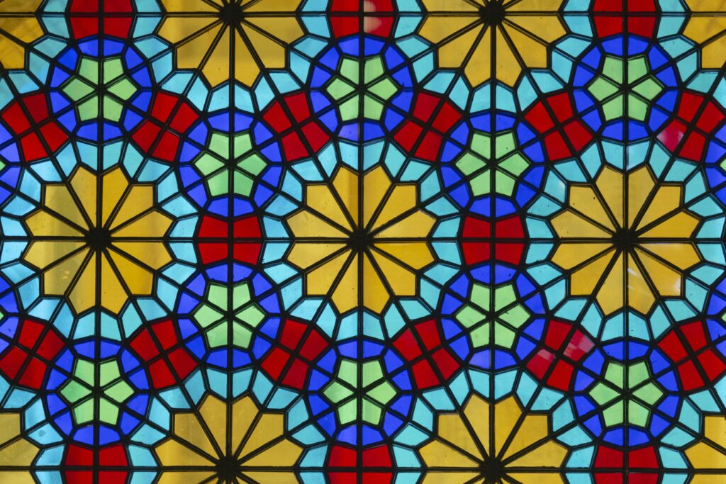 Vibrant Stained Glass Wallpaper: Colorful Elegant Background Design