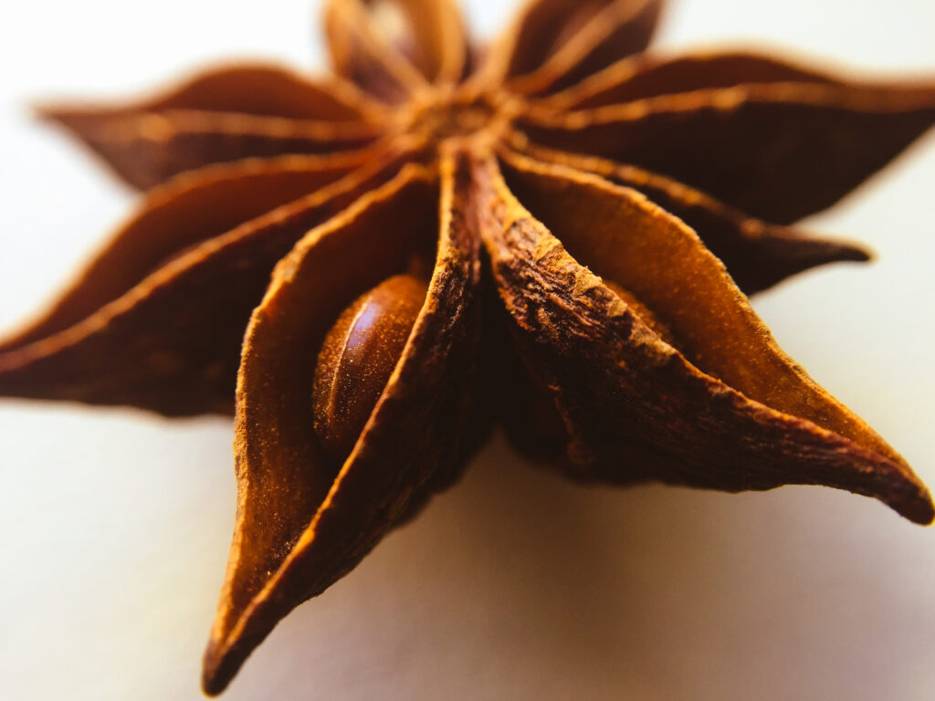 Close-Up Star Anise Spice: Detailed Texture & Symmetry Wallpaper