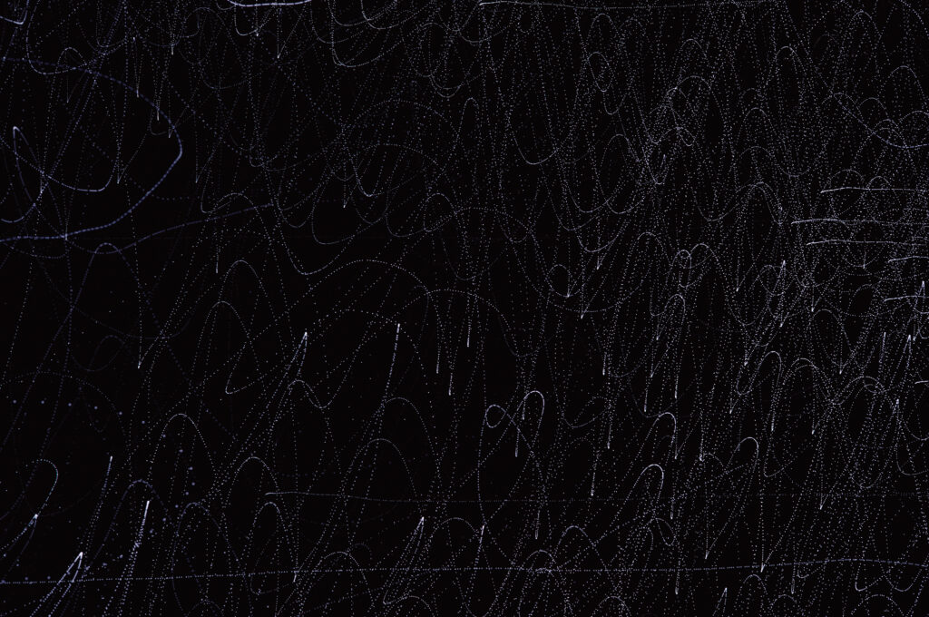 Intricate White Line Abstract Wallpaper on Black Background