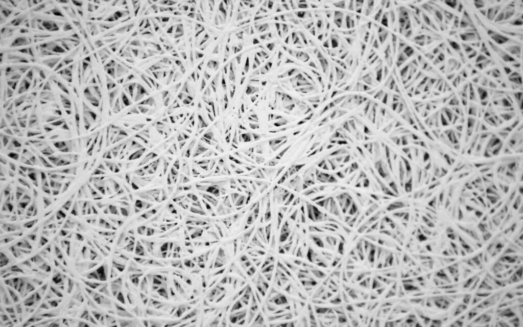 Intricate White Thread Wallpaper: Engaging Textured Background
