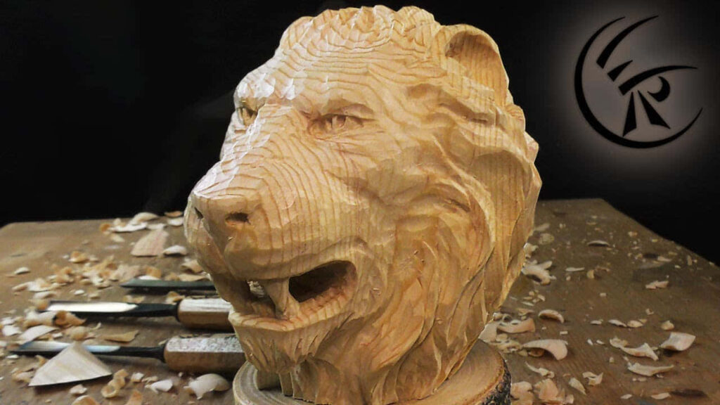 Intricate Carved Wooden Lion Head with Craftsmanship Tools Background Wallpaper