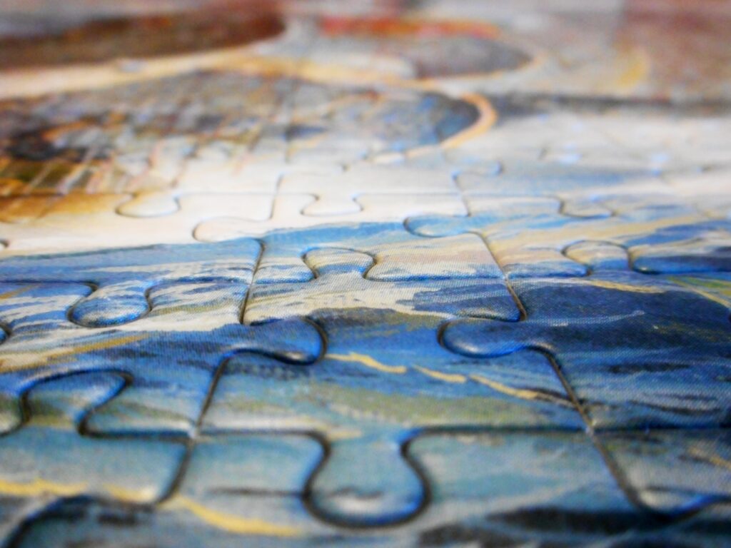 Intricately Assembled Puzzle Wallpaper Background with Colorful Detail