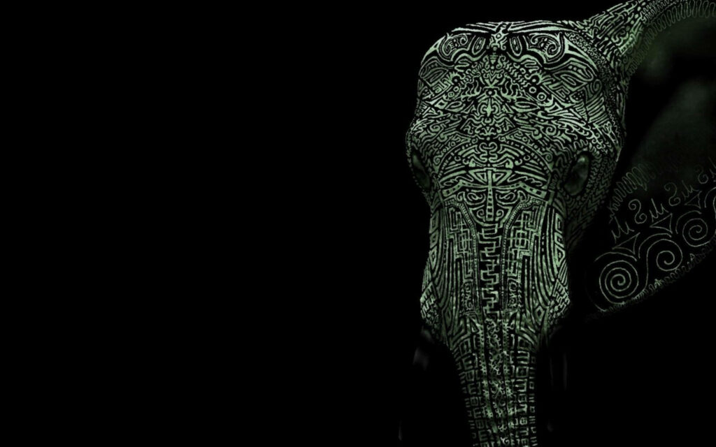 Tribal Elephant Art Wallpaper: Mystical Green Design on Black Background