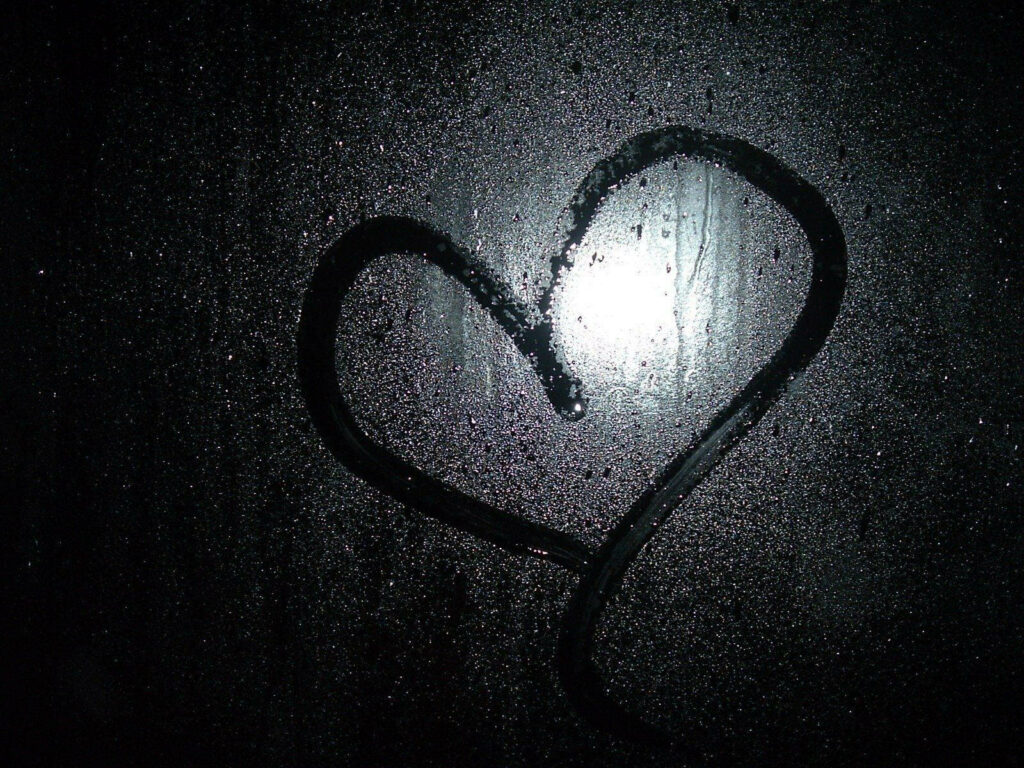 Black Love Enveloped in a Misty Window Wallpaper