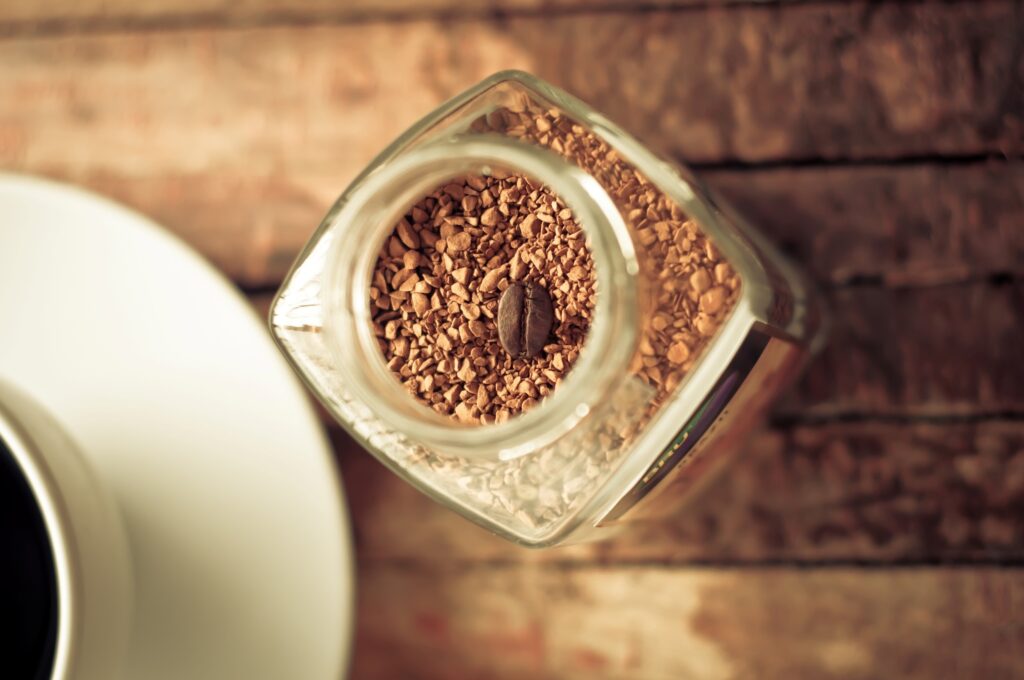 Cozy Coffee Jar & Cup on Rustic Wood - Inviting Wallpaper Background