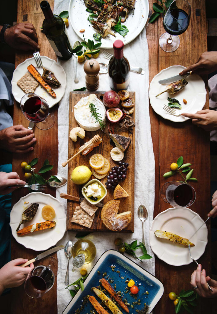 Inviting Dinner Table Wallpaper: Delicious Foods, Wine & Cozy Atmosphere