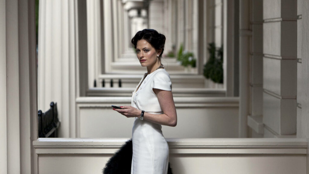 Irene Adler Wallpaper: Elegant Sophistication in White Attire