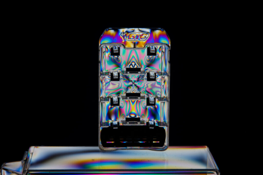 Iridescent Abstract Wallpaper: Vibrant Colors on Dark Background