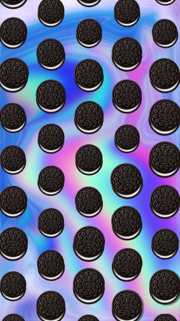 Vibrant Oreo cookie pattern on iridescent rainbow holographic purple blue wave wallpaper background