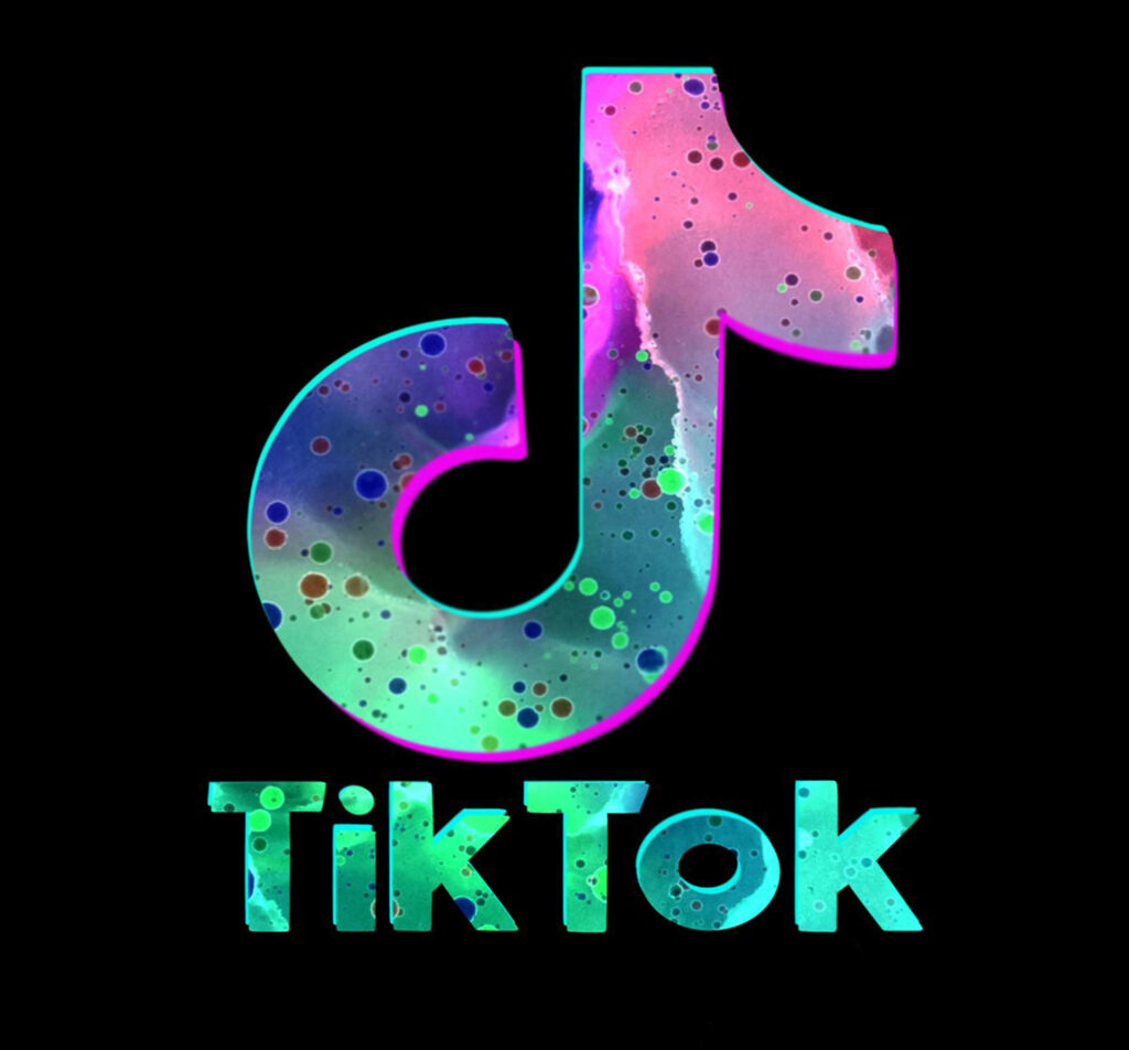 Vibrant TikTok logo wallpaper with iridescent pink blue green hues on black background