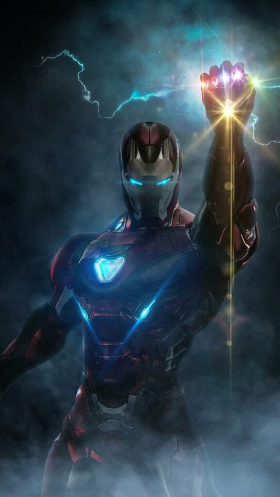 Iron Man raises glowing Infinity Gauntlet in misty background heroic Android wallpaper scene
