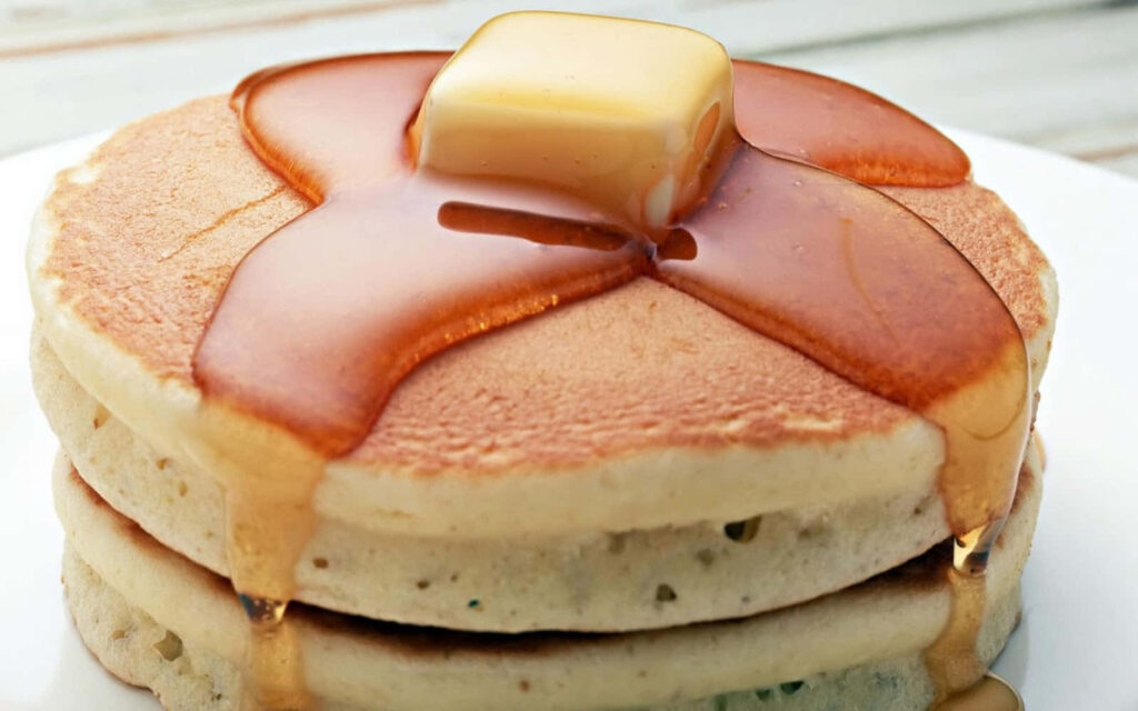 Fluffy Pancakes with Butter and Syrup - Irresistible Wallpaper Background