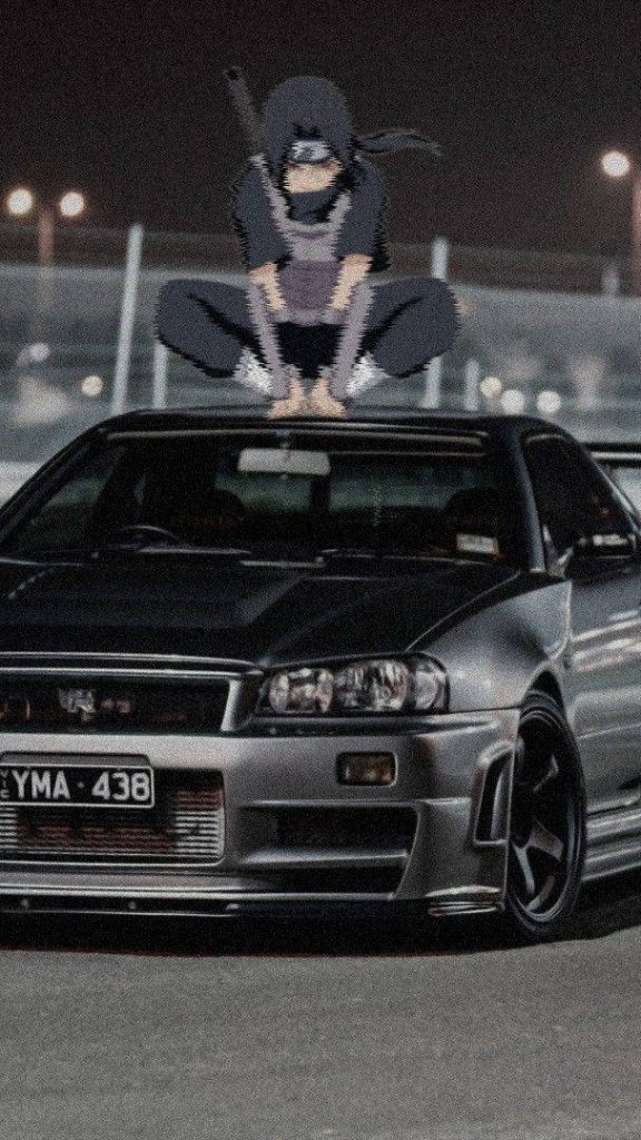 Itachi Uchiha crouching on silver Nissan Skyline GT-R R34 at night anime wallpaper background