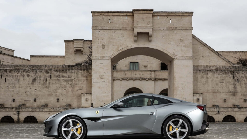 Exquisite Italian Artistry: Captivating Red Ferrari Portofino Gracing High-Resolution Wallpaper