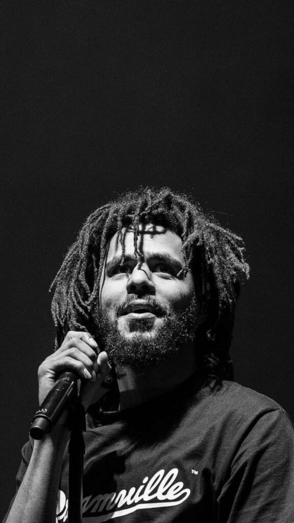 Infinite Melodies: Captivating J Cole in Monochrome Brilliance Wallpaper