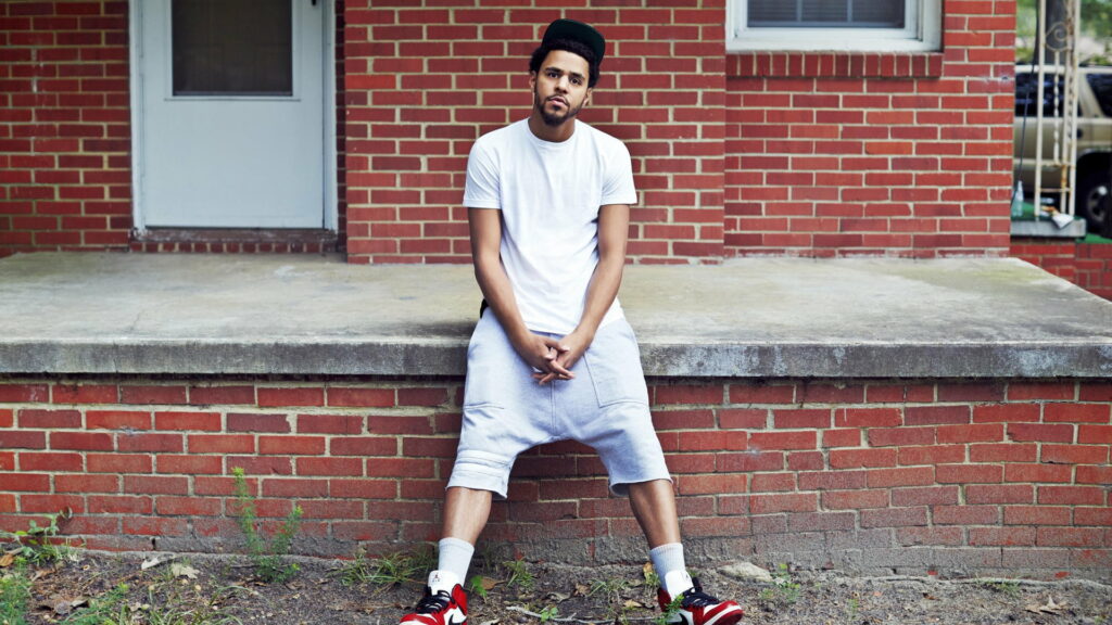 J Cole: Embracing the Rawness of Urban Aesthetics - HD Wallpaper
