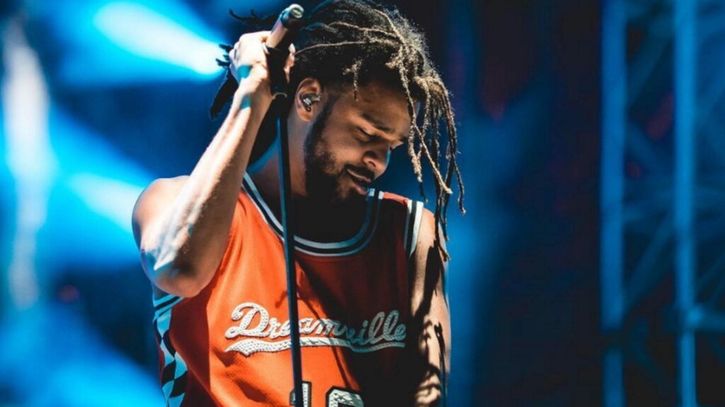 J. Cole: An American Rapper and Singer's Captivating HD Background Photo Wallpaper