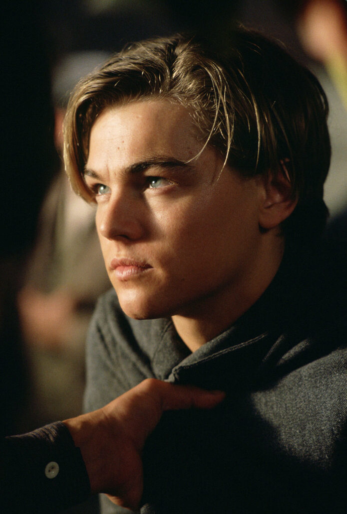Close-up portrait of Jack Dawson from Titanic with intense thoughtful expression and soft background Wallpaper