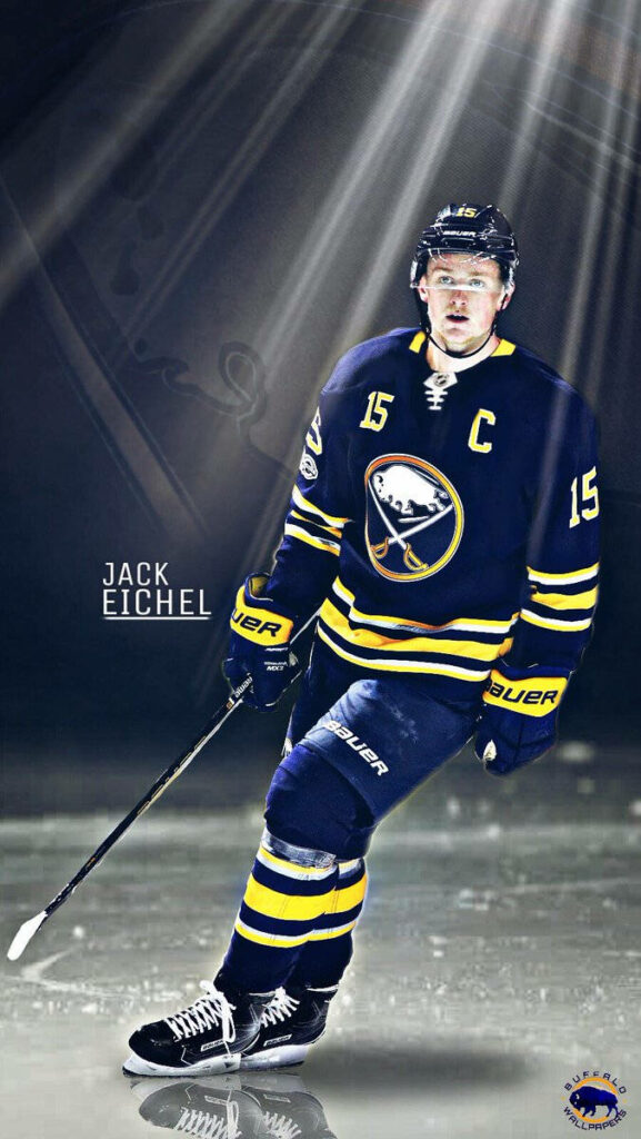 Jack Eichel Buffalo Sabres wallpaper dynamic pose ice rink spotlight athleticism captain