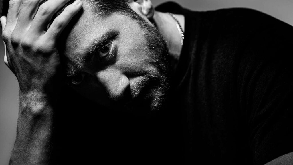 Jake Gyllenhaal monochrome wallpaper dramatic intense emotional portrait with sharp contrast