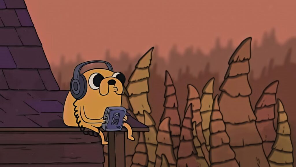 Jake from Adventure Time relaxing on rooftop listening to Walkman at sunset wallpaper background