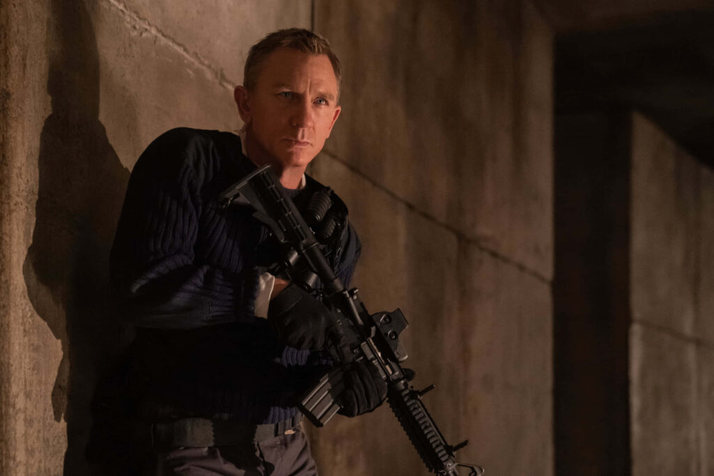 Action-Packed James Bond Wallpaper: Iconic Secret Agent Moment