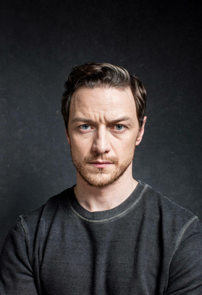 Scottish actor James McAvoy in dark sweater against textured background for The Guardian interview Wallpaper
