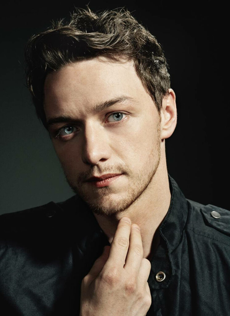 James McAvoy portrait wallpaper with thoughtful expression and sharp features on dark background