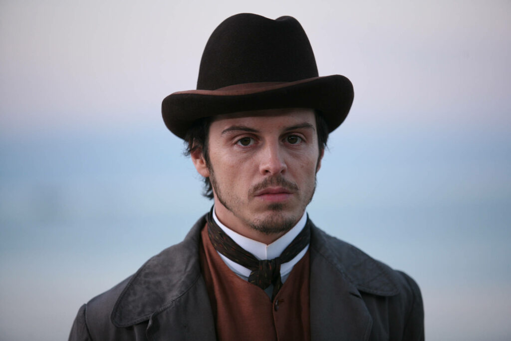 James Moriarty Wallpaper: Enigmatic Gaze in Classic Suit & Bowler Hat