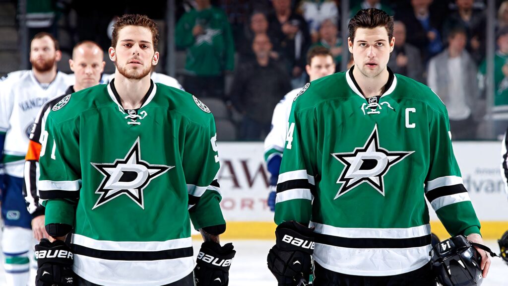 Jamie Benn and Tyler Seguin Dallas Stars green jerseys intense hockey game wallpaper background