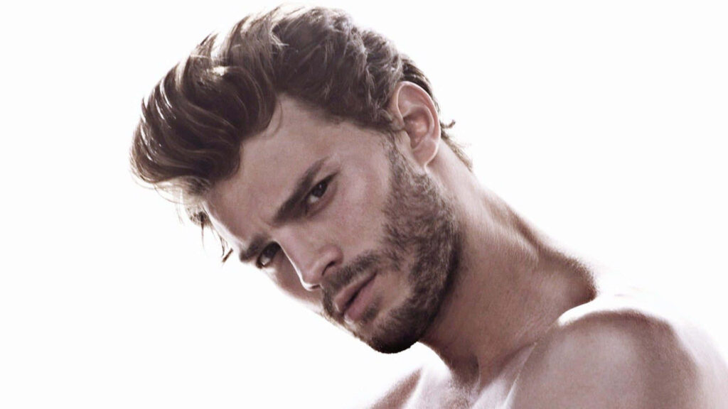 Jamie Dornan confident portrait rugged sophisticated look minimalist background wallpaper