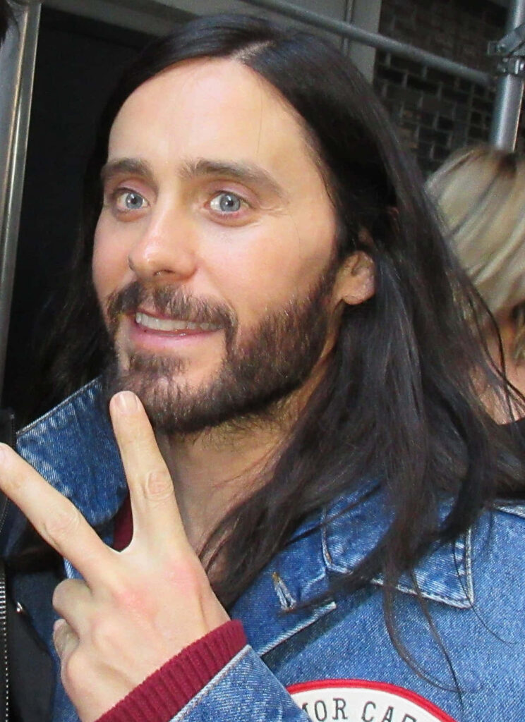 Jared Leto Wallpaper: Charismatic Charm in Denim Jacket & Long Hair