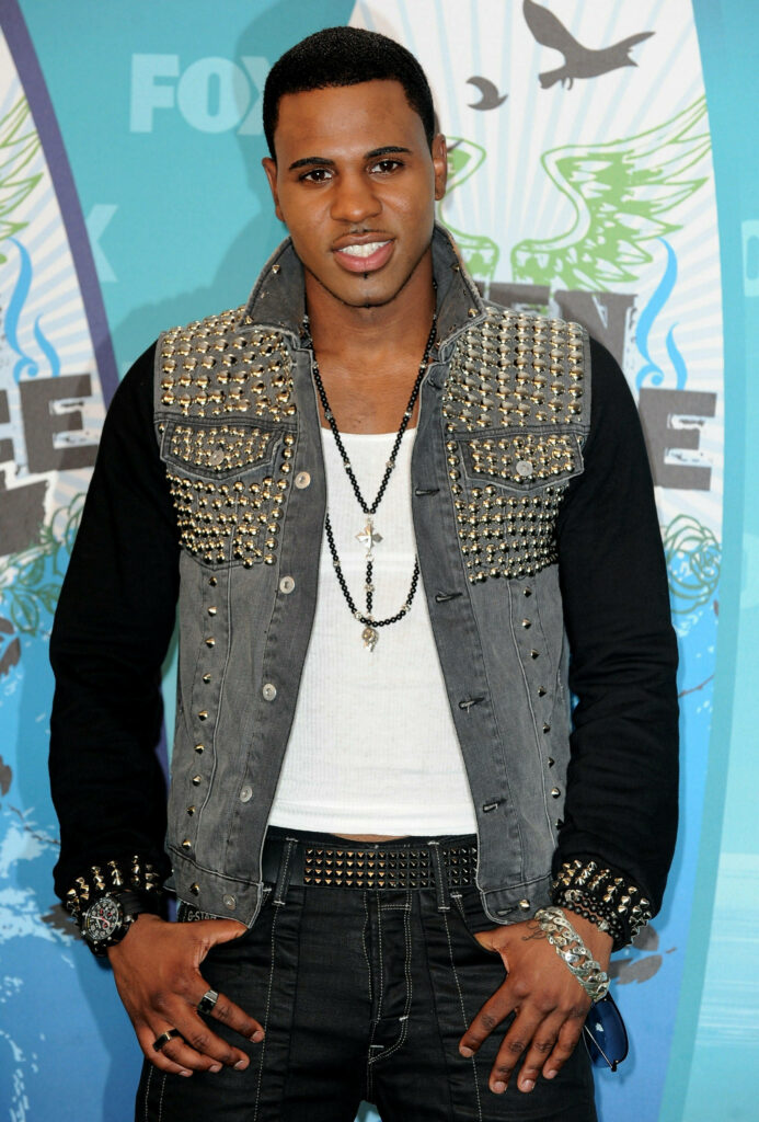 Jason Derulo 2010 Teen Choice Awards studded denim jacket colorful event backdrop wallpaper