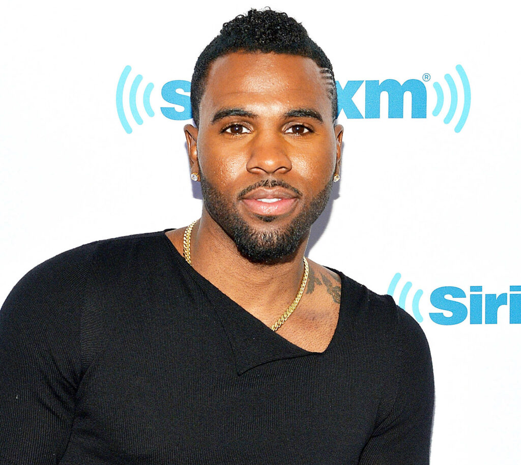 Jason Derulo confident pose at SiriusXM event vibrant wallpaper background signature style