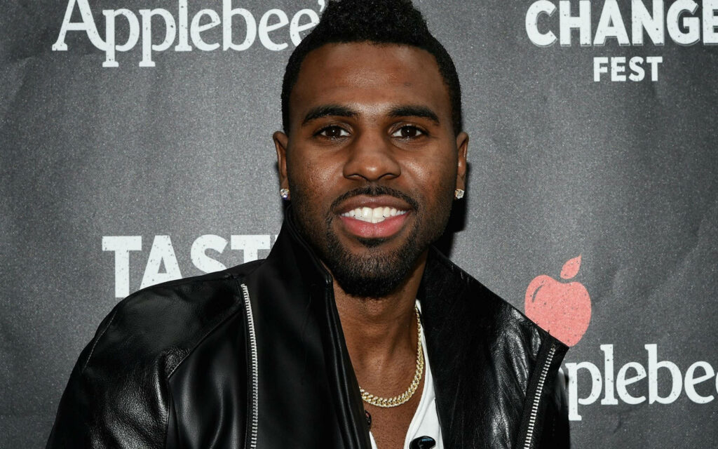 Jason Derulo smiling at Change Fest event vibrant wallpaper background for fans