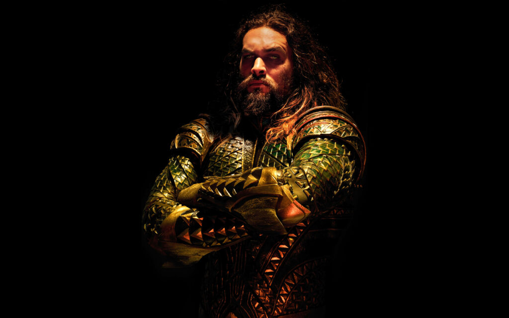 Jason Momoa in iconic Aquaman armor dramatic lighting dark background wallpaper image