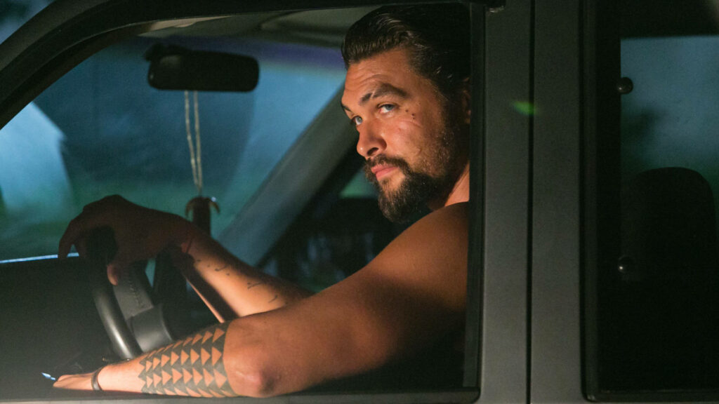 Jason Momoa driving car at night with tribal tattoo intense expression from The Red Road wallpaper