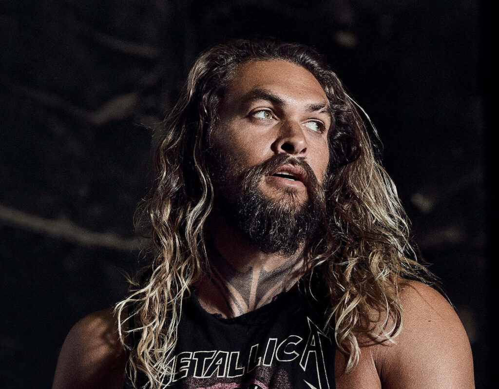 Jason Momoa rugged strength intense gaze long hair Men's Health wallpaper background image