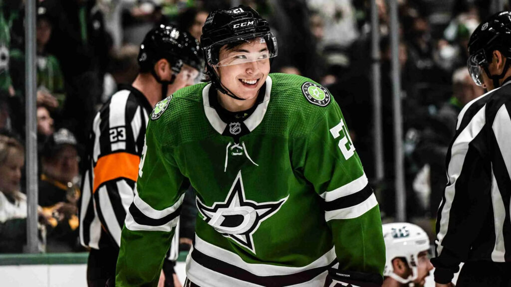 Jason Robertson Dallas Stars green jersey mid game ice rink hockey goal scorer wallpaper