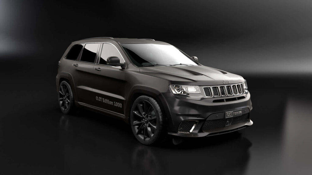 Jeep Trackhawk wallpaper with matte finish and black alloy wheels in dark background