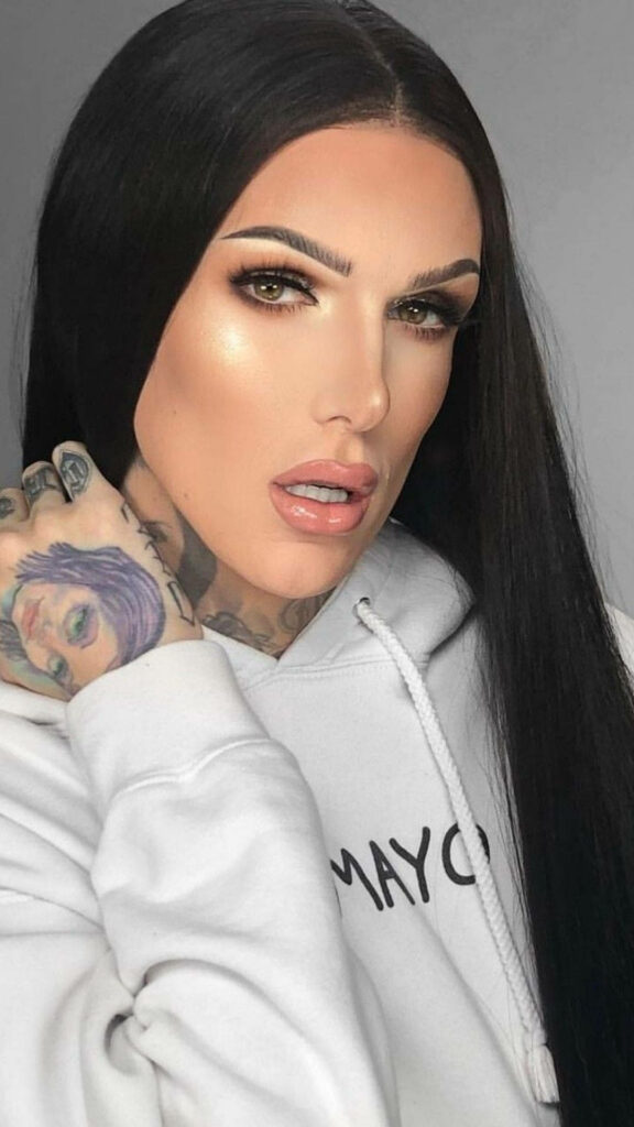 Jeffree Star bold luminous makeup intense glare neutral background striking wallpaper image