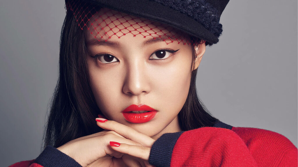 Red Hot Jennie Kim: Bold and Chic in Stylish Look Wallpaper