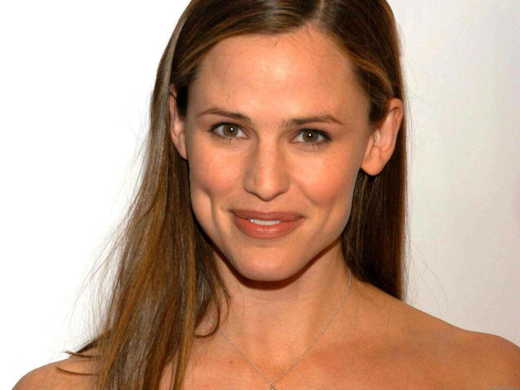Jennifer Garner smiling warmly showcasing natural beauty and graceful presence wallpaper background