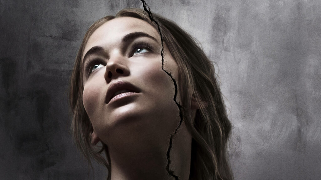 Jennifer Lawrence looking upward with dramatic crack on textured background intense wallpaper