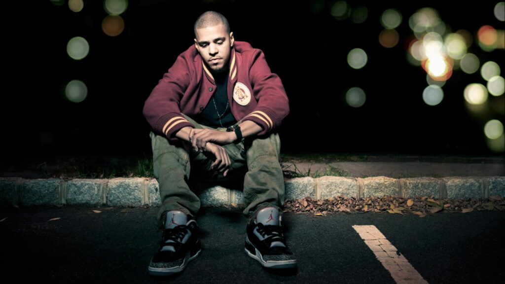 The Phenomenal J Cole: A Captivating HD Wallpaper showcasing the Talented Rapper Jermaine Lamarr Cole