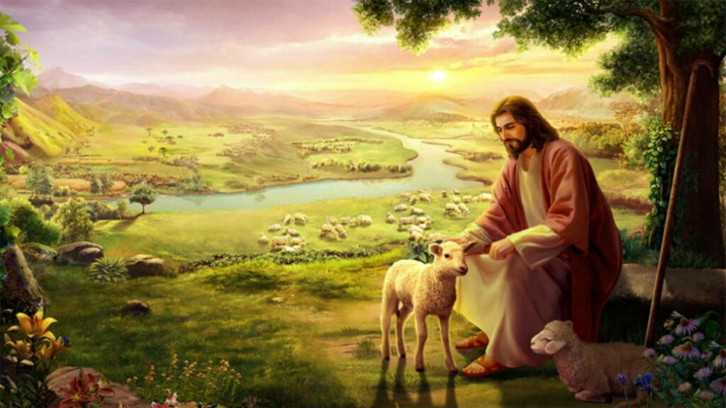 The Gentle Shepherd: A Desktop Wallpaper of Jesus Petting a Lamb in a Serene Countryside Backdrop