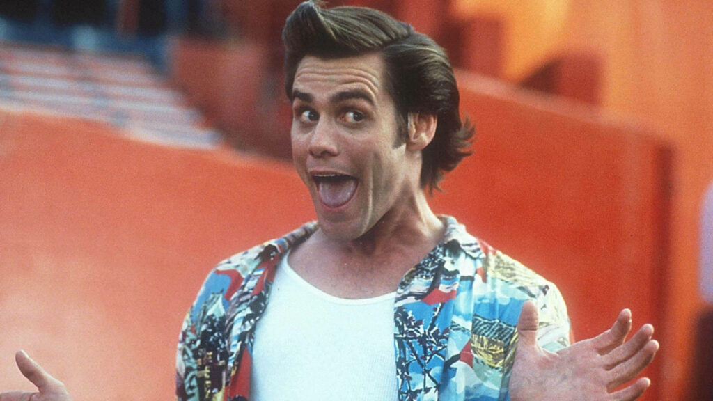 Jim Carrey animated expression vibrant wallpaper energetic playful comedy legend background
