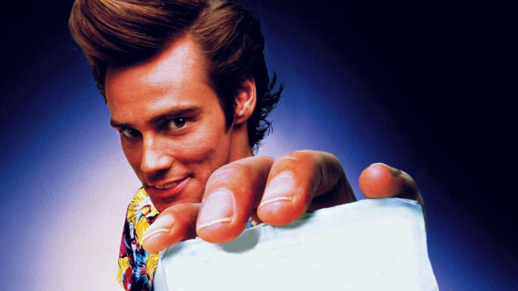 Jim Carrey vibrant playful pose iconic comedic expression colorful wallpaper background