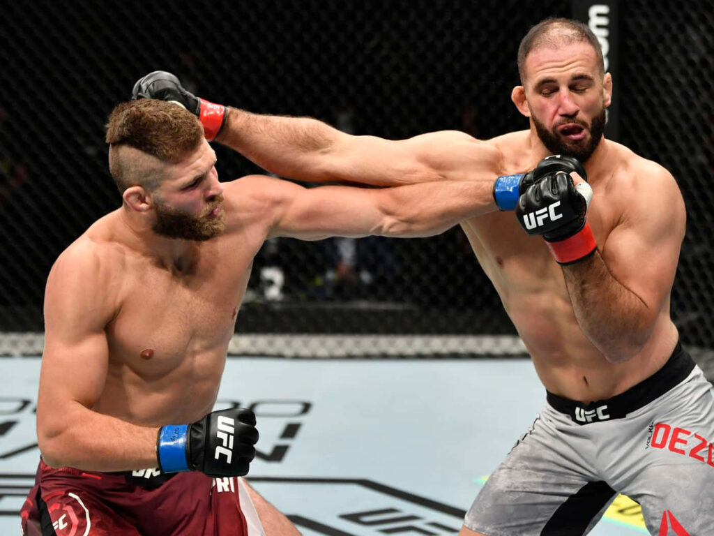 Jiri Prochazka lands powerful punch on Volkan Oezdemir UFC 251 light heavyweight fight action Wallpaper