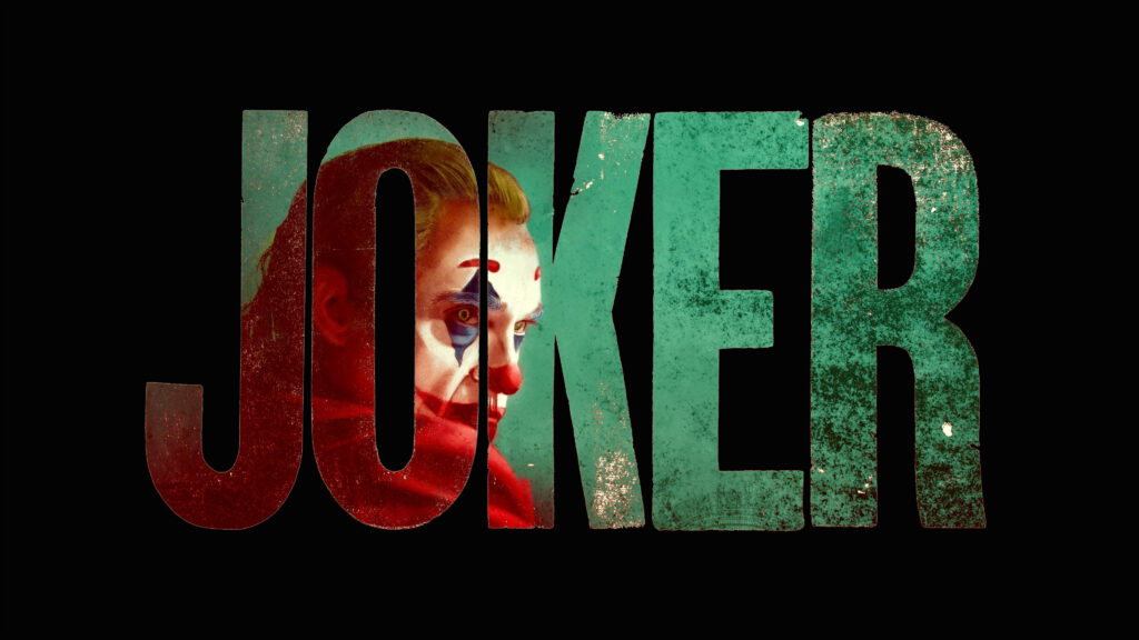 Joaquin Phoenix's Haunting Stare: Black Ultra HD Joker Poster Wallpaper